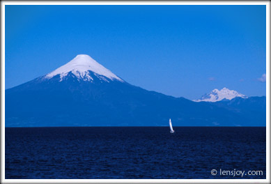 Sailboat and Volcn Osorno -- Photo  Chris Carvalho/Lensjoy.com